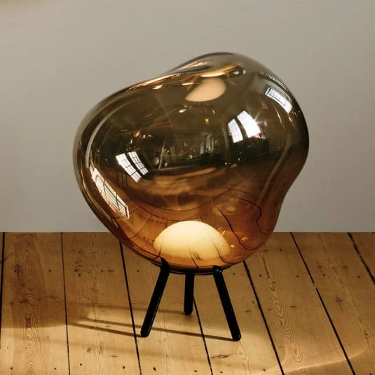 Lámpara LED recargable para terraza Melt grande de Tom Dixon, color bronce