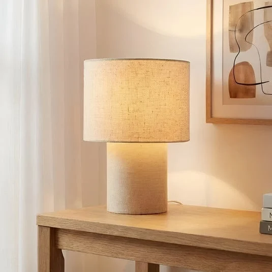 Lámpara de mesa Lindby Elfie, Ø 23 cm, beige, lino, E27