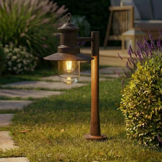 Bolardo luminoso Lindby Eloretta, óxido, 60 cm, acero, IP44, E27