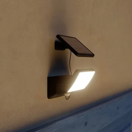 Lámpara de pared LED solar Philips Fyns, negra, con sensor, IP44