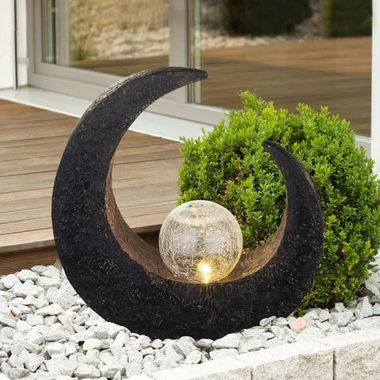 Lámpara decorativa LED solar de Lindby Adem, marrón rojizo, cristal, 31 cm